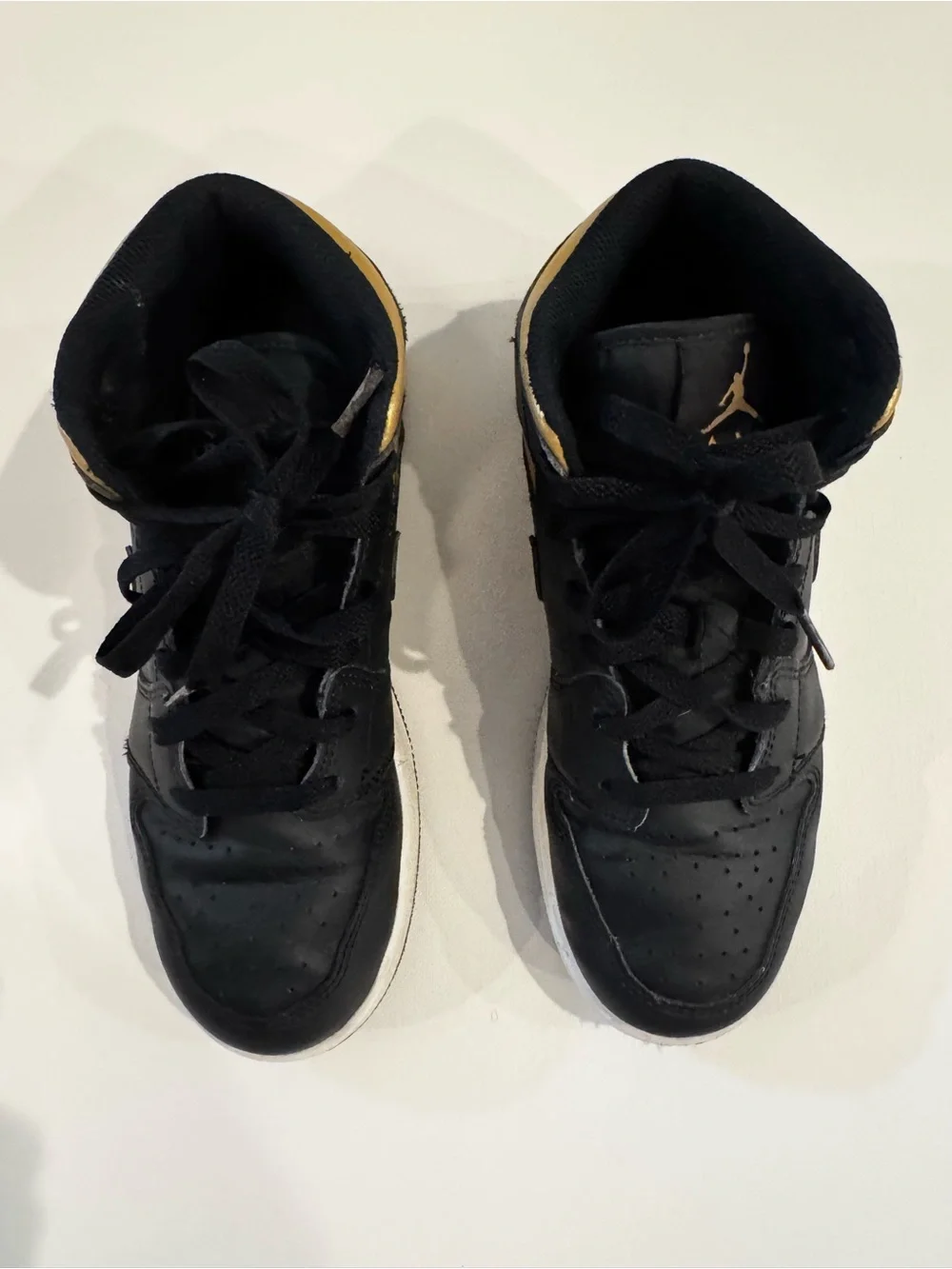 Nike Air Jordan 1 Mid Black with Gold Swoosh
